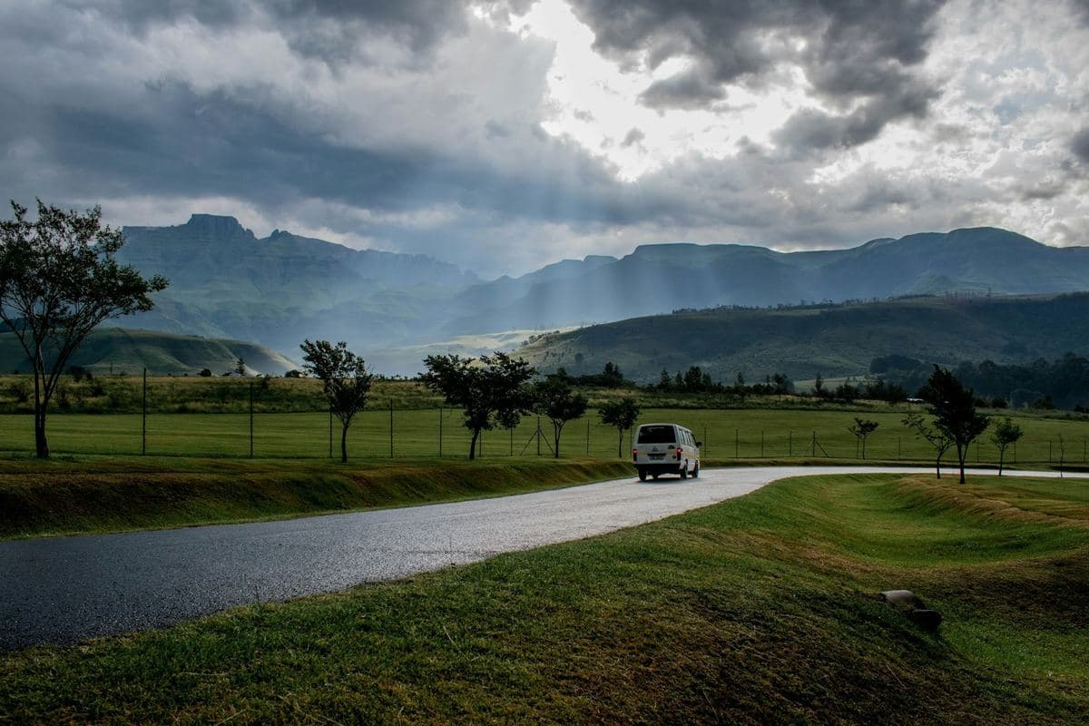 White passenger shuttle van on a Costa Rican road