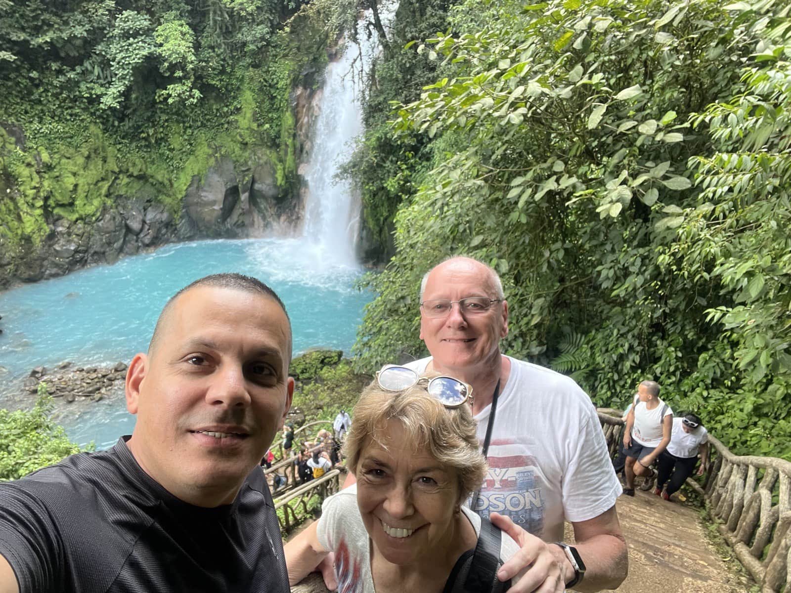 Diego with customers at the Río Celeste waterfall in Costa Rica